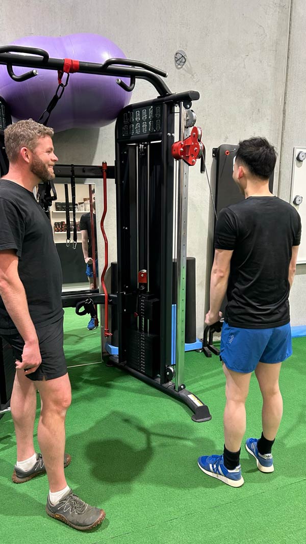 Client performing tricep extension