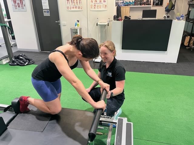 Physio Emma with Client